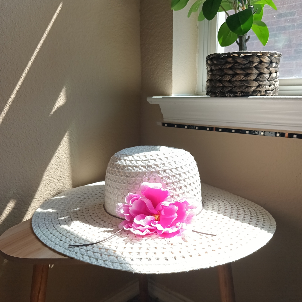 Elegant White Sun Hat with Pink Floral Detail